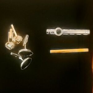 Bundle of tie clips and cuff links